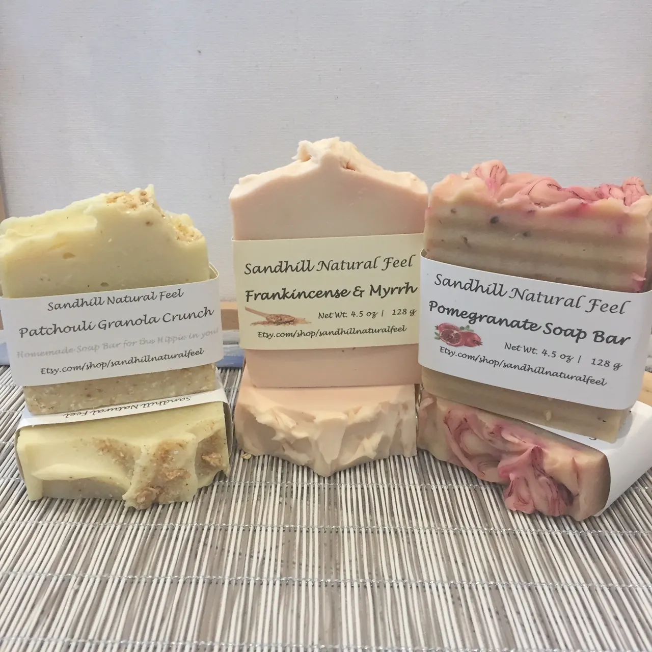 Handmade soaps stacked at a vendor’s booth