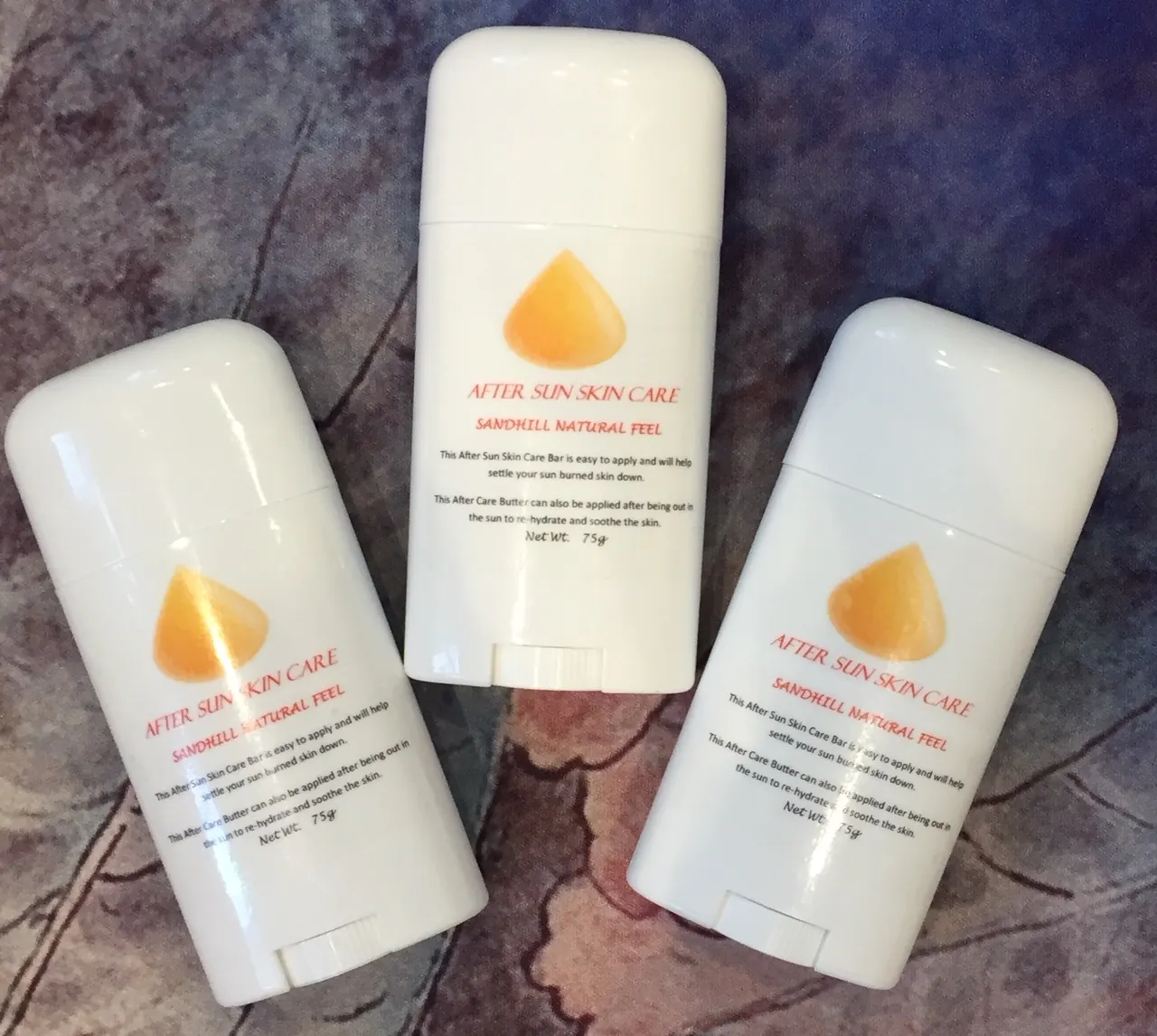 Sun care sticks on a shop shelf